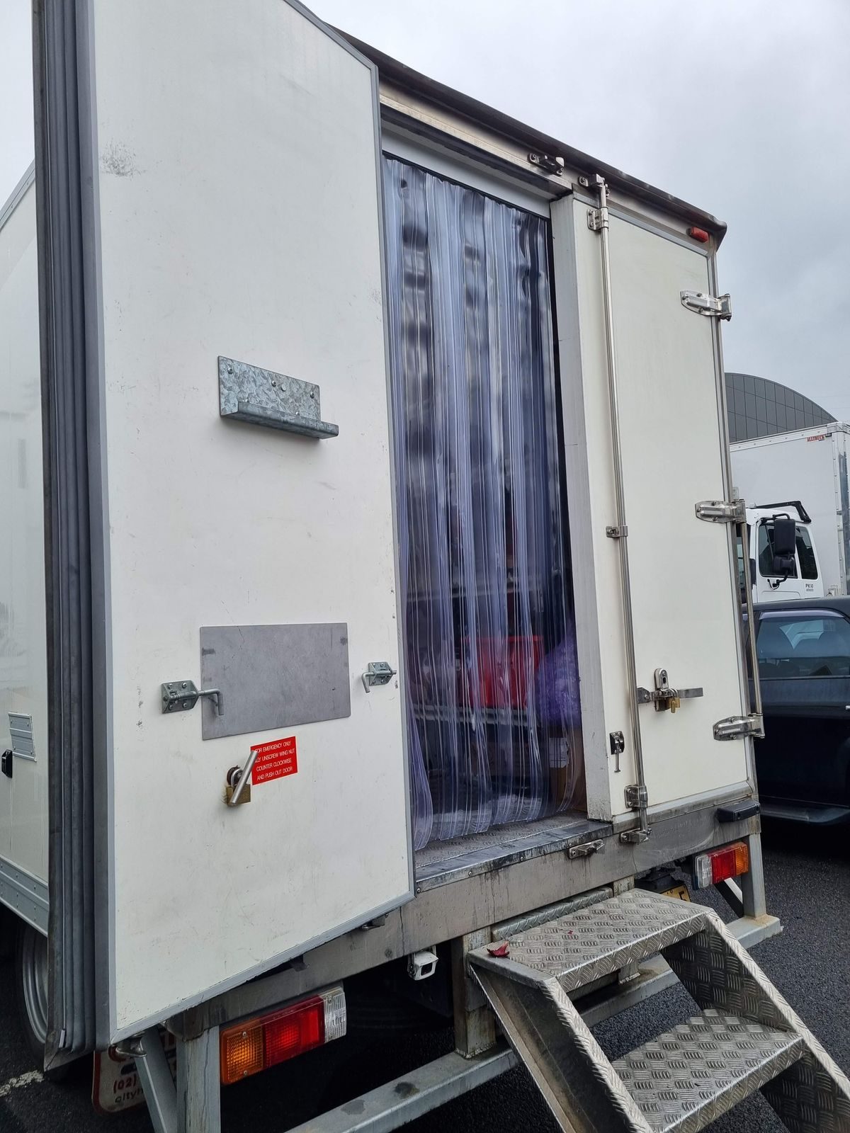 PVC strip curtain fitted inside the rear doors of a refrigerated delivery truck